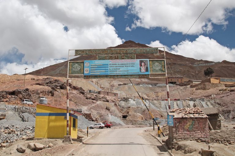 The gate to the Bolivian Mining Corporation's Cerro Rico, or Rich Hill, in Potosí, Bolivia sports a photograph of the nation's current President Evo Morales